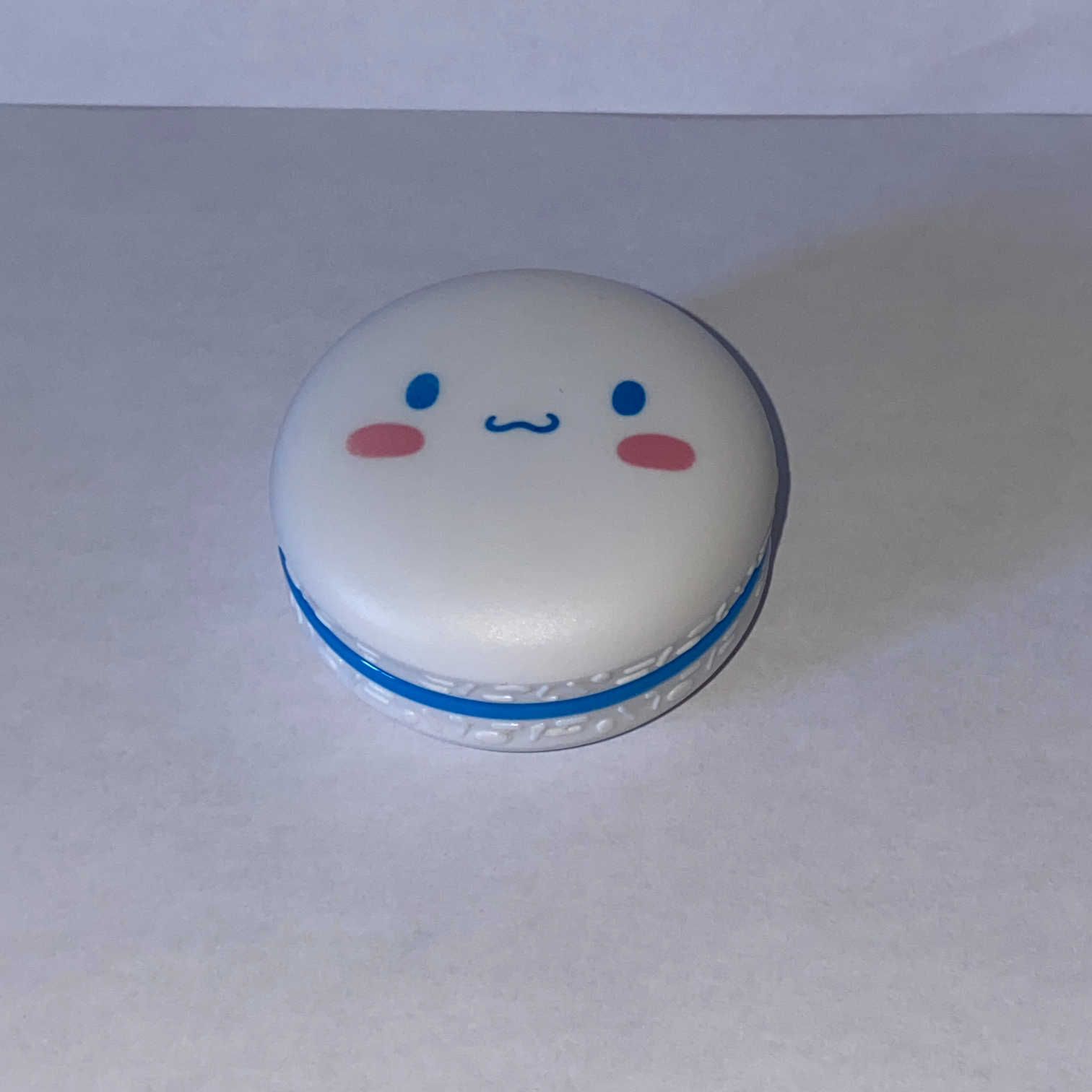 An image of a chapstick container.