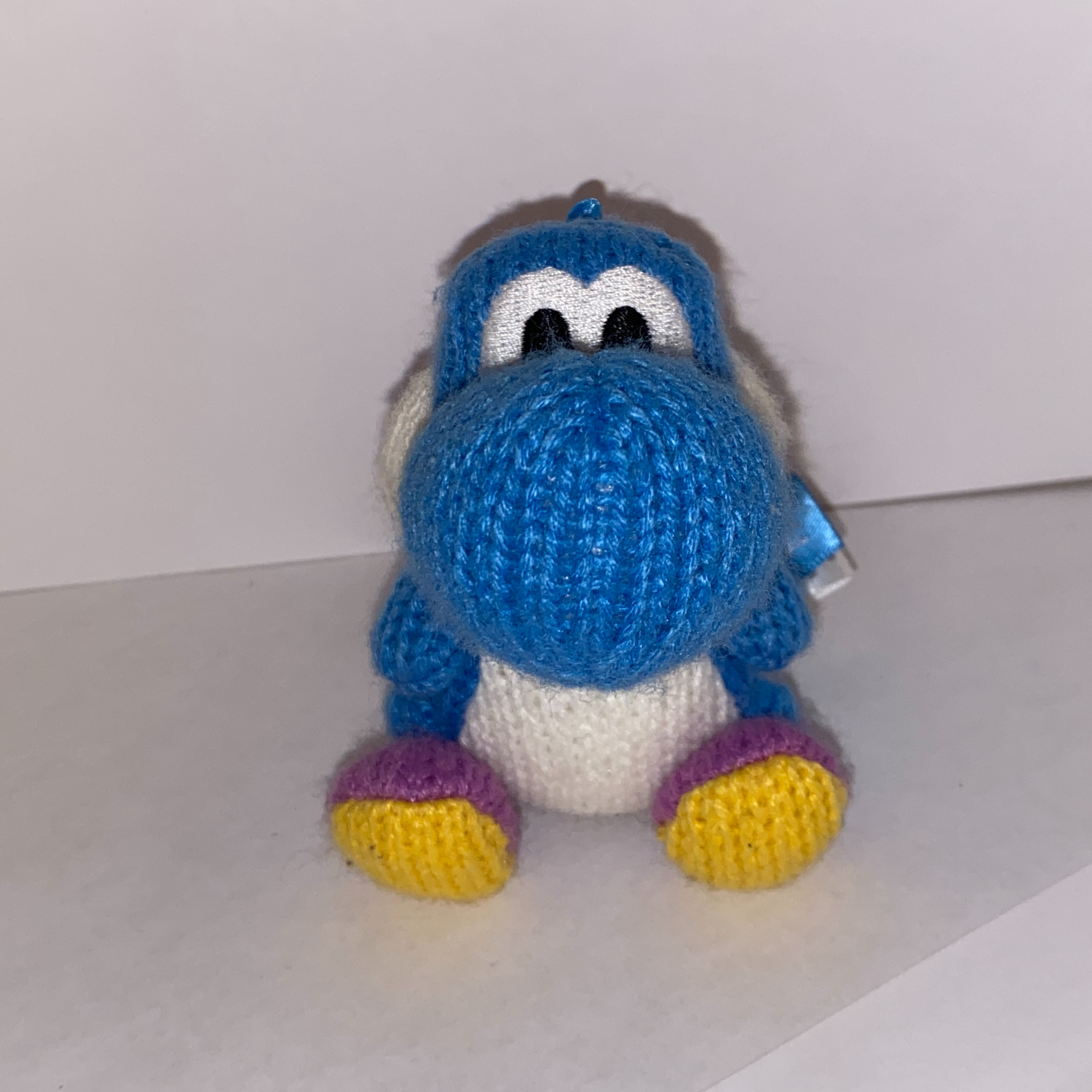 An image of a Yoshi plushie.