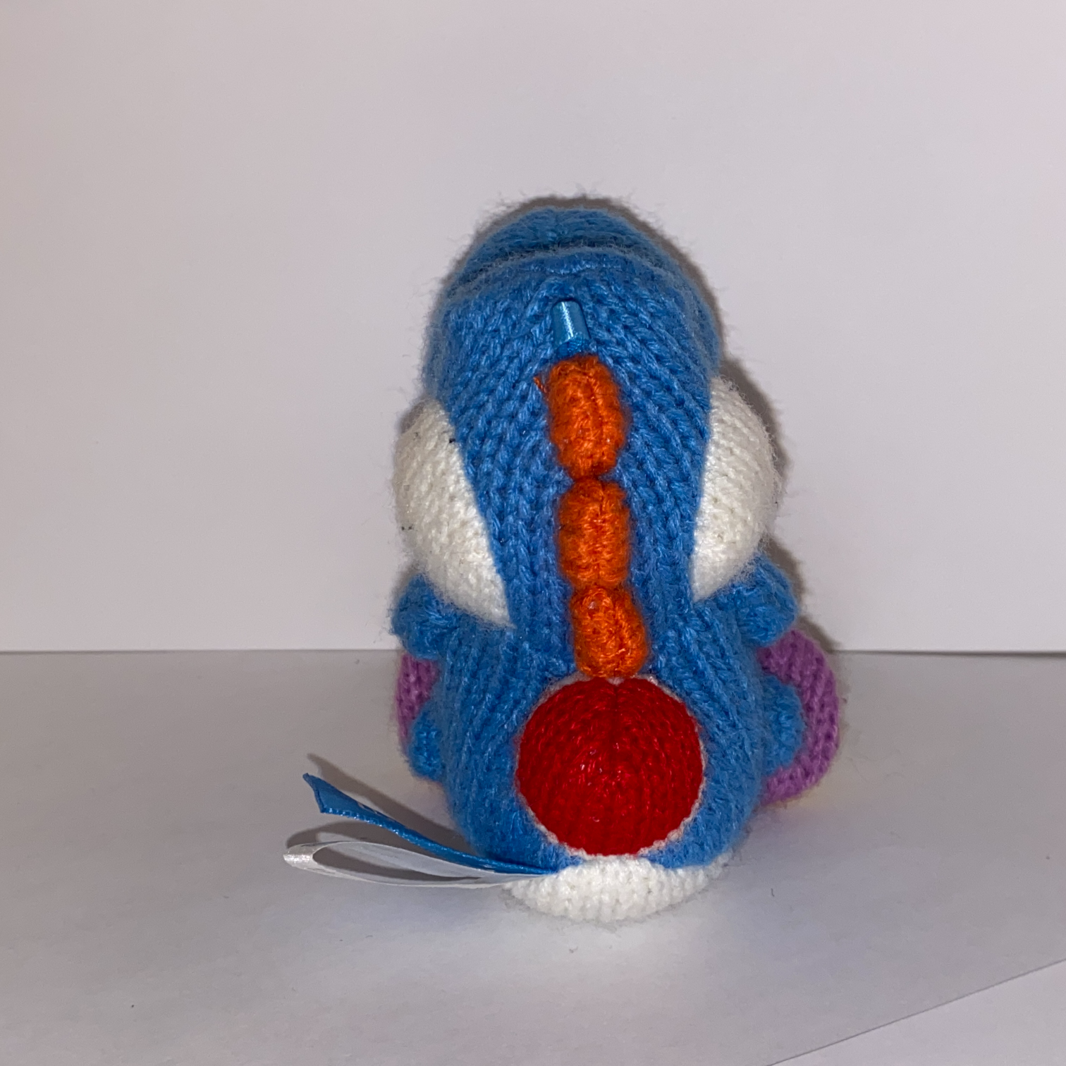 An image of a Yoshi plushie.