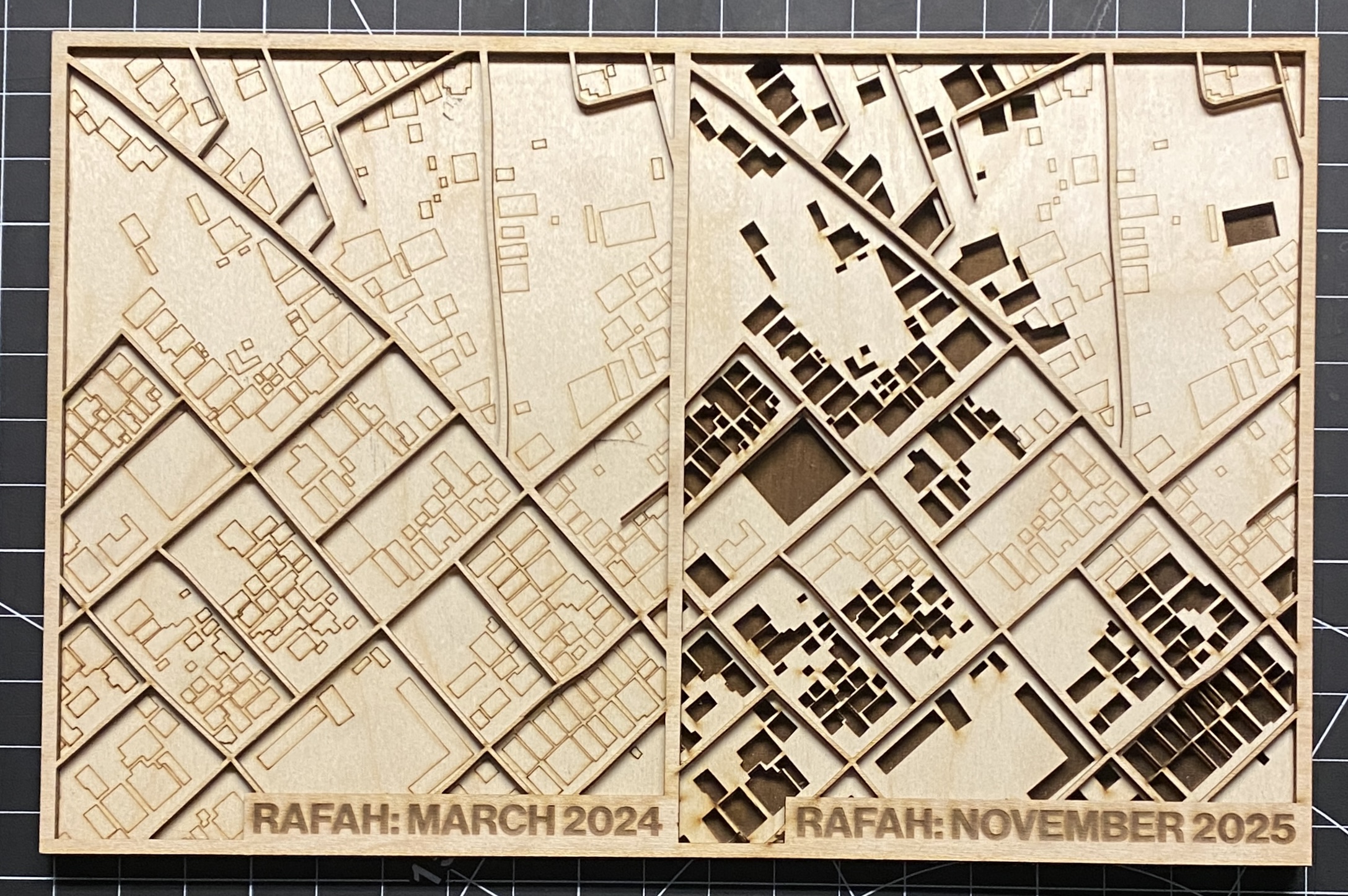 My final laser cut map, portraying the damaging effects of the ongoing genocide in Palestine, specifically showcasing its effects in the city Rafah. My map specifically highlights the buildings that were once there (March 2024), and comparing how it looked then to how it looks currently (November 2025).